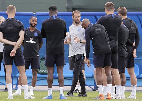 England head coach Gareth Southgate, centre, instructs his team during England's official training in Repino near St. Petersburg, Russia, Sunday, June 17, 2018. | AP