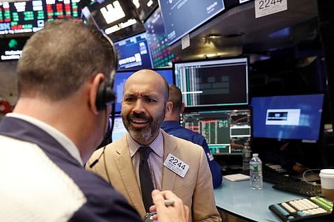 Traders work on the floor of the New York Stock Exchange shortly after the opening bell in New York, U.S. (File Photo | REUTERS)