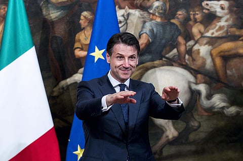 Italy's New Premier Giuseppe Conte gestures during the handover ceremony at Chigi Palace Premier's office, in Rome, Friday, June 1, 2018. (AP Photo)
