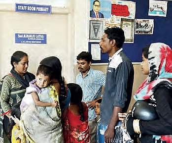 Parents argue with Raj Bhavan school staff about the lack of admissions on Friday | Express photo