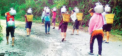 Young men carry water on their backs from a stream in Darjeeling district of West Bengal| Photos Courtesy Deep Milan Pradhan