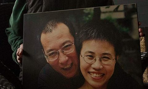 Liu Xia and husband Liu Xiabo (AP File Photo)
