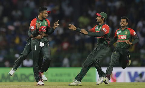 Bangladesh's Shakib Al Hasan, left, celebrates the the dismissal of Sri Lanka's Danushka Gunathilaka with his team mates during their second Twenty20 cricket match in Nidahas triangular series in Colombo, Sri Lanka, Friday, March 16, 2018. | PTI File Phot