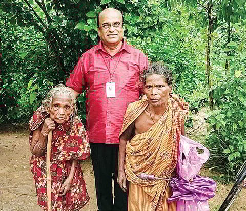 Dr NB Jayaprakash with two elderly widows from Ghathaon, Odisha