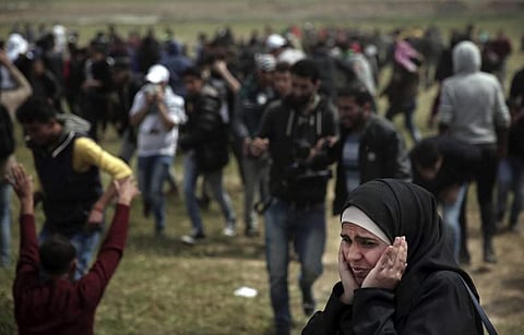 The protests peaked on May 14 when at least 62 Palestinians were killed as thousands approached the heavily guarded border fence on the same day the United States moved its Israel embassy from Tel Aviv to Jerusalem. | AP