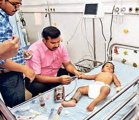 One of the four children being treated at a city private hospital after receiving MR vaccination on Saturday| Express