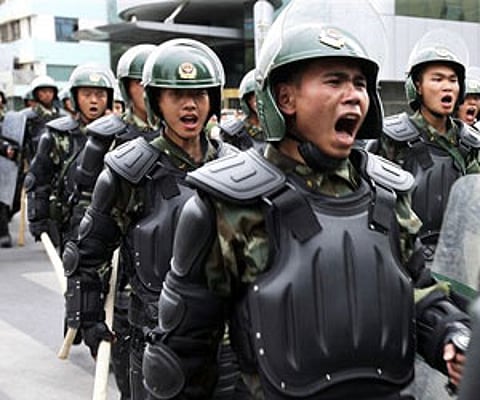 Chinese paramilitary police patrol in Urumqi, western China's Xinjiang province. (File | AP)