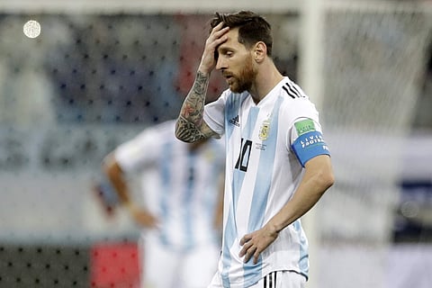 Argentina's Lionel Messi reacts after the third goal of Croatia during the group D match between Argentina and Croatia at the 2018 soccer World Cup in Nizhny Novgorod Stadium in Nizhny Novgorod. | AP