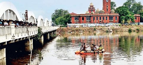 Police rescuing a person who jumped from the Napier Bridge on Monday | Express