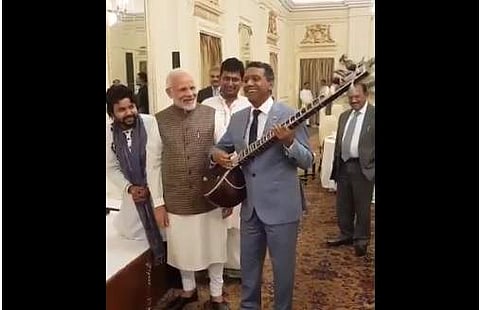 Seychelles president playing the Sitar. (Twitter video screengrab)