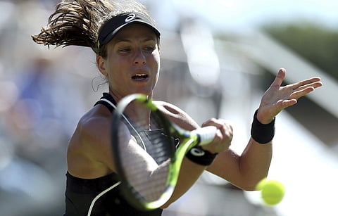 Britain's Johanna Konta returns the ball to Serbia's Aleksandra Krunic on day three of the Nature Valley International at Devonshire Park, Eastbourne, south England. | AP