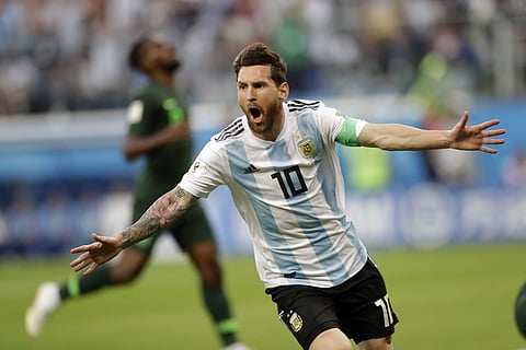 Argentina's Lionel Messi celebrates after scoring the opening goal of his team during the group D match between Argentina and Nigeria, at the 2018 World Cup