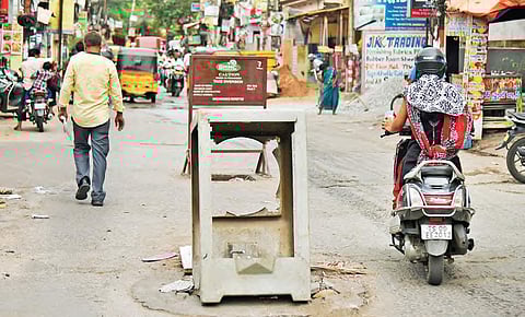 Ameerpet residents use a plastic scrap as a lid to cover a manhole in Hyderabad on Tuesday | Vinay Madapu
