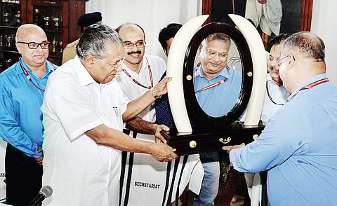 Chief Minister Pinarayi Vijayan presents a memento to outgoing Chief Secretary Paul Antony on Thursday | Vincent pulickal