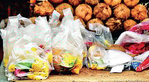Plastic carry bags being used to sell flowers, in Hyderabad | vinay madapu