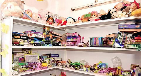 John Monteiro (right) and his toys and books bank | Rajesh Shetty Ballalbagh