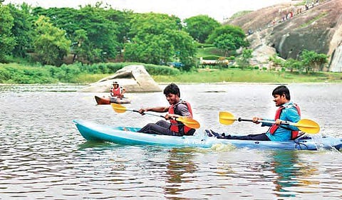 Tourists kayaking at Gundu Cheruvu near Warangal fort on Friday.