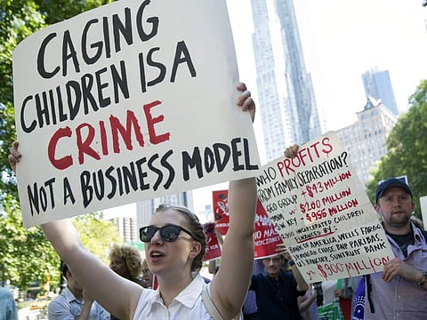 Protesters chant slogans outside a Federal court during a demonstration calling for the abolishment of Immigration and Customs Enforcement, or ICE, and demand changes in U.S. immigration policies. (Photo | AP)