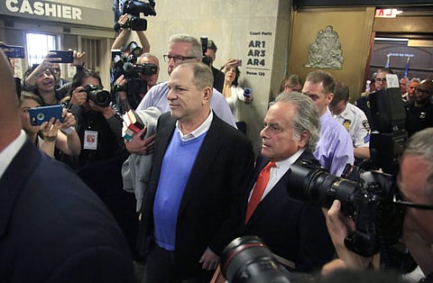 Harvey Weinstein (C) leaves with his lawyer Benjamin Brafman (R) (File Photo | AP)