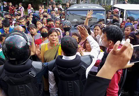 People from different parts of the city stage a protest Meghalaya Secretariat during curfew in Shillong on Monday June 04 2018. | PTI