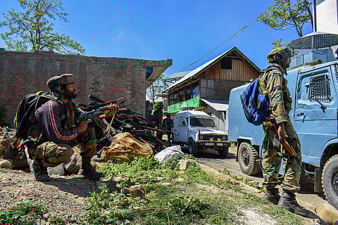Security personnel stand guard during an encounter between security forces and militants at Drabgam in Pulwama District of South Kashmir. Image used for representational purpose only. (File Photo | PTI)