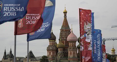 Flags with the logo of the World Cup 2018 on display with the St. Basil's Cathedral in the background, in Moscow, Russia | AP