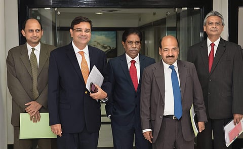 L-R RBI Deputy Governor Viral Acharya Governor Urjit Patel Deputy Governors B P Kanungo and N S Vishwanathan with Executive Director Michael Patra at the RBI headquarters after the announcement of a 0.25 per cent rate hike by the central bank in Mumbai. |