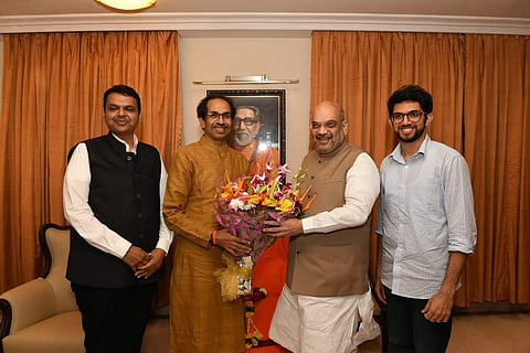 BJP President Amit Shah greets Uddhav Thackeray. (PTI)