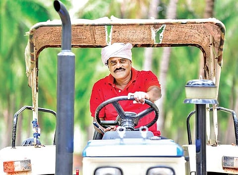 A file picture of Gubbi MLA and Minister S R Srinivas at his farm | Express