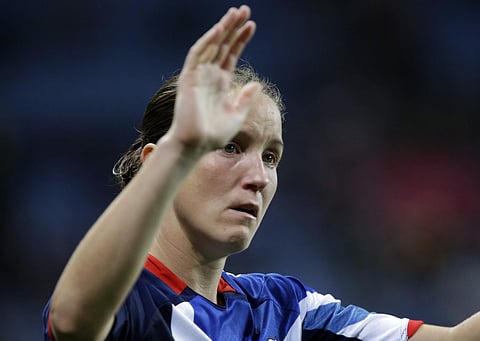Britain's Casey Stoney waves to the fans after her team lost their quarterfinal women's soccer match against Canada, at the 2012 London Summer Olympics. (File photo | AP)