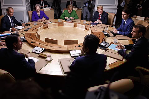 Clockwise from top left, President of the European Council Donald Tusk, British Prime Minister Theresa May, German Chancellor Angela Merkel, U.S. President Donald Trump, Canadian Prime Minister Justin Trudeau, French President Emmanuel Macron, Japanese Pr