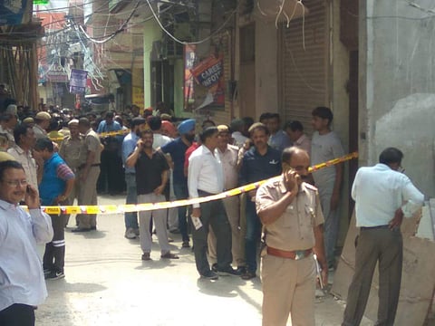 Police personnel in front of the house, in which 11 dead bodies were found in Sant Nagar in north Delhi's Burari on Sunday. | (Praveen Negi | EPS)