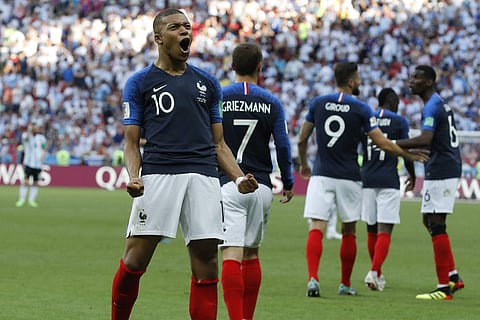 France's Kylian Mbappe celebrates after scoring his side's third goal against Argentina. (Photo | AP)