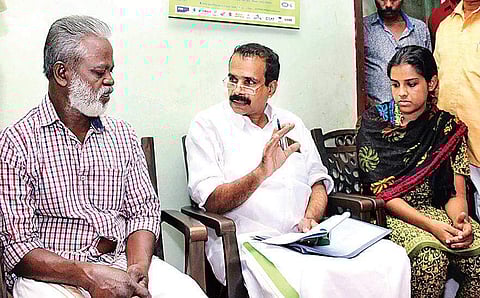 National Minority Commission vice-chairman George Kurien talking to Kevin’s fiancee Neenu Chacko and his father Joseph Jacob| Express