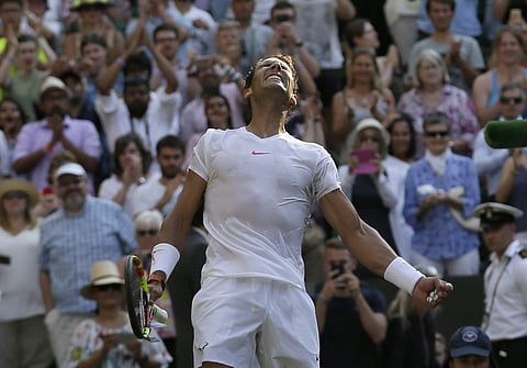 Rafael Nadal of Spain celebrates winning his men's singles match against Czech Republic's Jiri Vesely, on day seven of the Wimbledon Tennis Championships, in London. (Photo | AP)