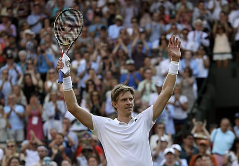 Kevin Anderson of South Africa celebrates defeating Gael Monfils of France during their men's singles match on the seventh day at the Wimbledon Tennis Championships in London. (Photo | AP)