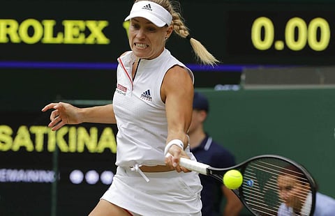Germany's Angelique Kerber returns to Russia's Daria Kasatkina, during their women's singles quarterfinals match at the Wimbledon Tennis Championships, in London. (Photo | AP)
