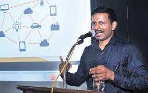 K Viju addresing the seminar at Public Library on Monday A Sanesh