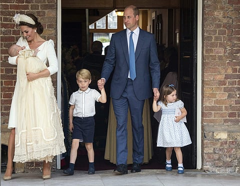 Kate Middleton and Prince William with their three chidlren at newborn Prince Louis' christening on June 9, 2018. (Photo | AP)
