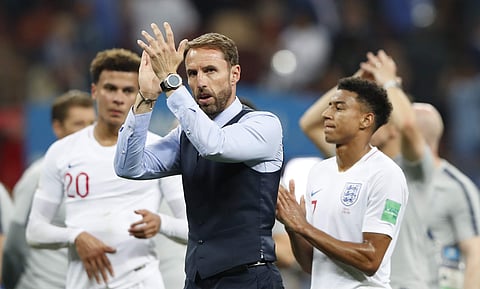 England head coach Gareth Southgate walks the field at the end of the semifinal match between Croatia and England at the 2018 soccer World Cup in the Luzhniki Stadium in Moscow, Russia, Wednesday, July 11, 2018. | AP