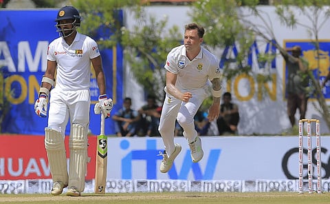 Sri Lanka's Danushka Gunathilaka,left, watches as South Africa's Dale Steyn delivers a ball during the first day's play of their first test cricket match in Galle, Sri Lanka. (Photo | AP)