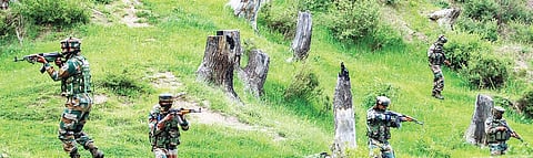 Representational image of army personnel take positions during an encounter with militants. (PTI)