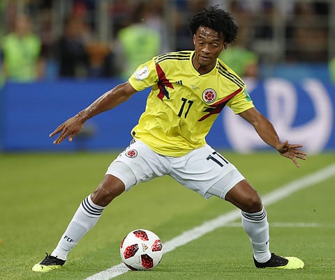 Colombia's Juan Cuadrado controls the ball during the round of 16 match between Colombia and England at the 2018 soccer World Cup in the Spartak Stadium, in Moscow, Russia, Tuesday, July 3, 2018. | AP