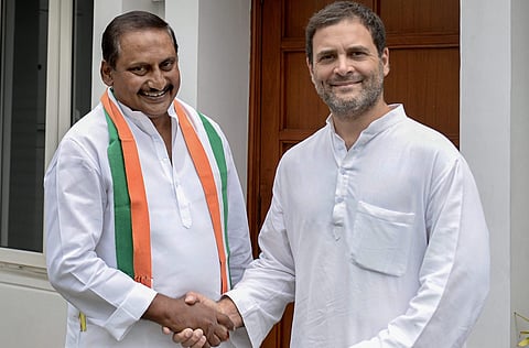 Congress President Rahul Gandhi welcomes former chief minister of united Andhra Pradesh N Kiran Kumar Reddy as he re-joins the party in New Delhi. (Photo | PTI)