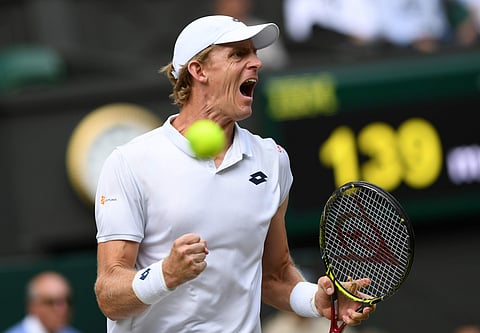 Kevin Anderson of South Africa celebrates winning a point from John Isner of the US during their men's singles semifinal match at the Wimbledon Tennis Championships, in London. (Photo | AP)
