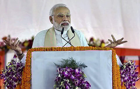 Prime Minister Narendra Modi speaks during the inauguration of Bansagar canal project and foundation laying ceremony of Mirzapur Medical college during a public meet in Mirzapur on Sunday. (Photo | PTI)