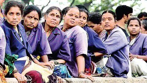 BBMP pourakarmikas sat for a dharna at Banappa Park last year for regularisation of contract workers (Photo | EPS)