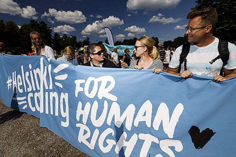 Thousand protesting in Helsinki to promote human and sexual rights, democracy and environmental issues ahead of Monday's summit (Photo |AP)