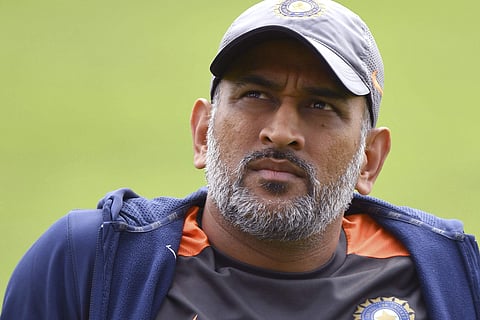 India's MS Dhoni stis, during a nets session at Headingley Carnegie, in Leeds, England. | AP