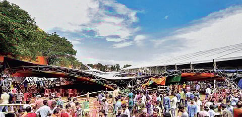 People stand near a tent that collapsed during PM’s ‘Krishi Kalyan Sabha’ in Midnapore, West Bengal, on Monday | PTI
